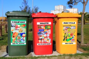 Three garbage bins used for PVC plastic and other types